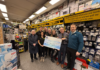 Decwells team with cheque for Our Lady's Hospice