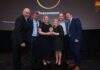 Patrick Atkinson, Chief Executive Officer of Chadwicks Group, the Chadwicks Roscommon team, winners of Chadwicks Branch of the Year, and Mark O’Reilly from Gyproc, sponsors of this year’s award.